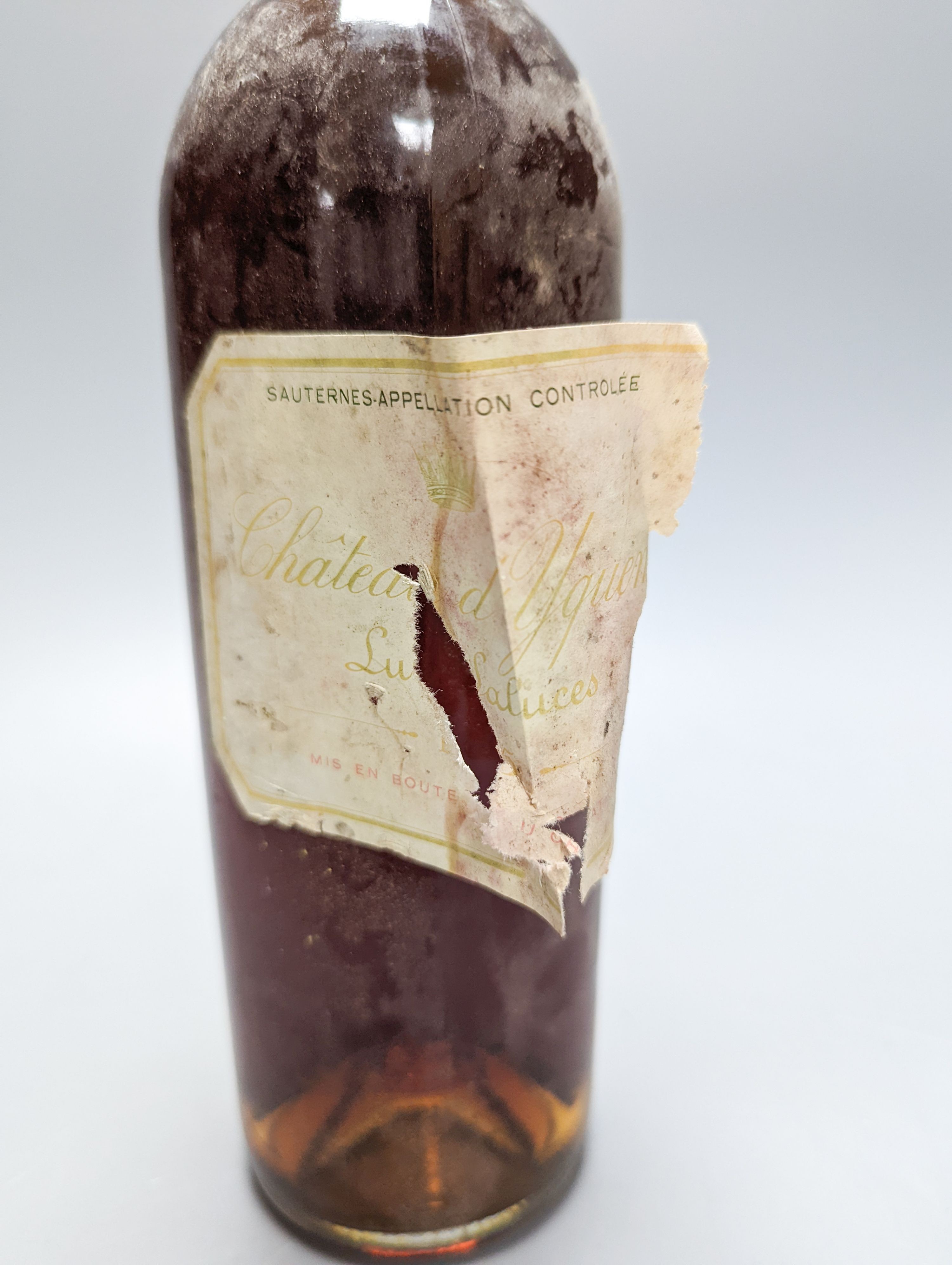 Two bottles of Chateau D'Yquem Sauternes 1967-1965, and a 375ml bottle